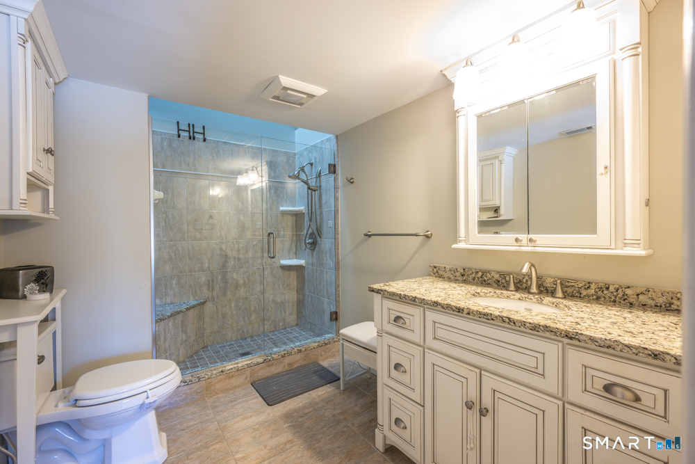 565 Newfield Street, Unit 34 Middletown, CT 06457 - Photo 9 of 17 Morning routines just got better. An updated primary bath designed for comfort, ease, and a little everyday luxury.