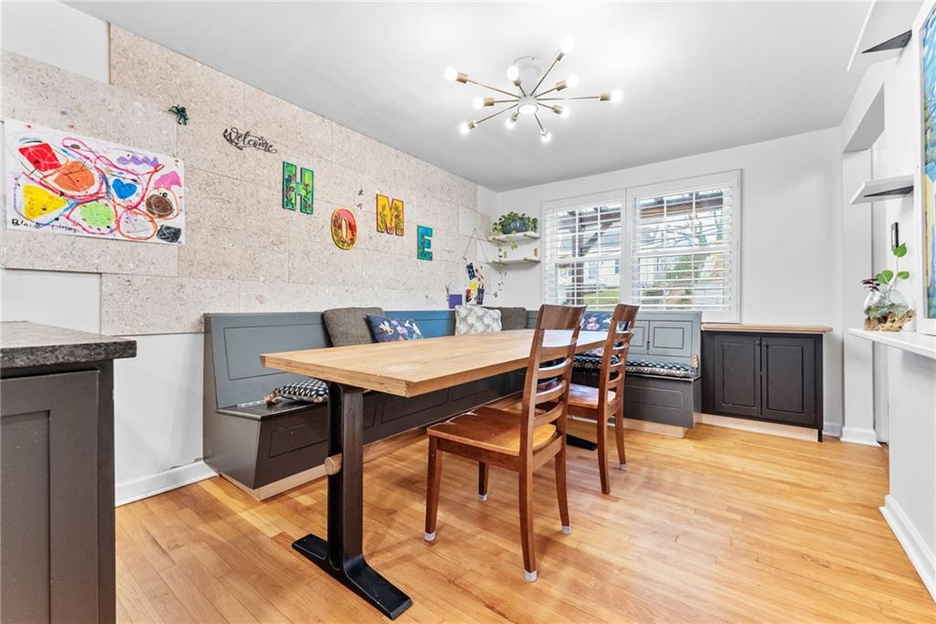 357 Hazel Drive Pittsburgh, PA 15228 - Photo 15 of 39 a view of a dining room with furniture window and wooden floor