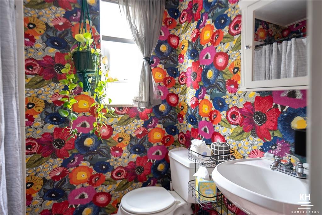 357 Hazel Drive Pittsburgh, PA 15228 - Photo 23 of 39 a bathroom with a toilet sink and mirror