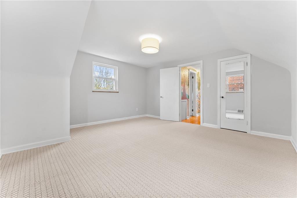357 Hazel Drive Pittsburgh, PA 15228 - Photo 26 of 39 an empty room with closet and mirror