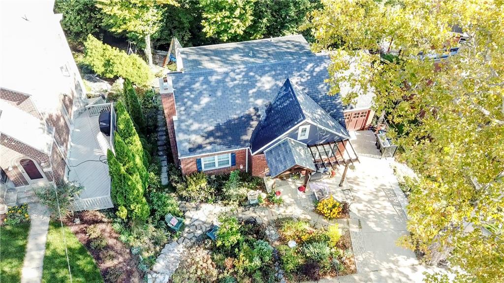 357 Hazel Drive Pittsburgh, PA 15228 - Photo 3 of 39 an aerial view of a house with a big yard and large trees