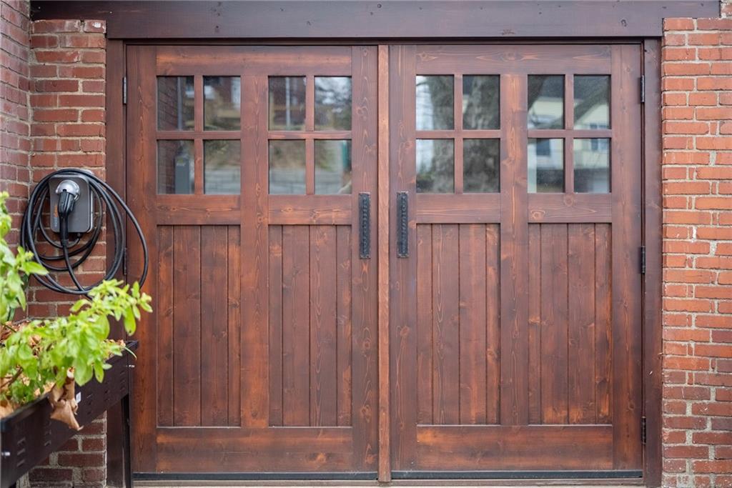 357 Hazel Drive Pittsburgh, PA 15228 - Photo 33 of 39 a front view of a house with a potted plant and more windows