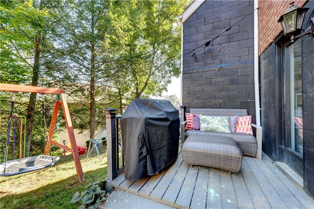 357 Hazel Drive Pittsburgh, PA 15228 - Photo 37 of 39 a view of a deck with couches and wooden floor