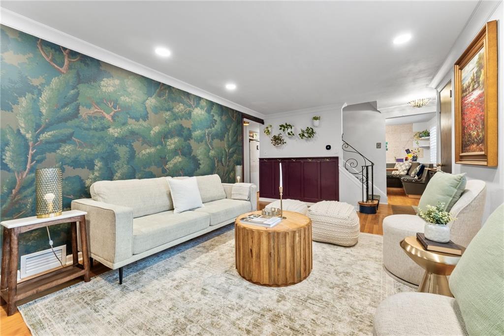 357 Hazel Drive Pittsburgh, PA 15228 - Photo 8 of 39 a living room with furniture and a flat screen tv