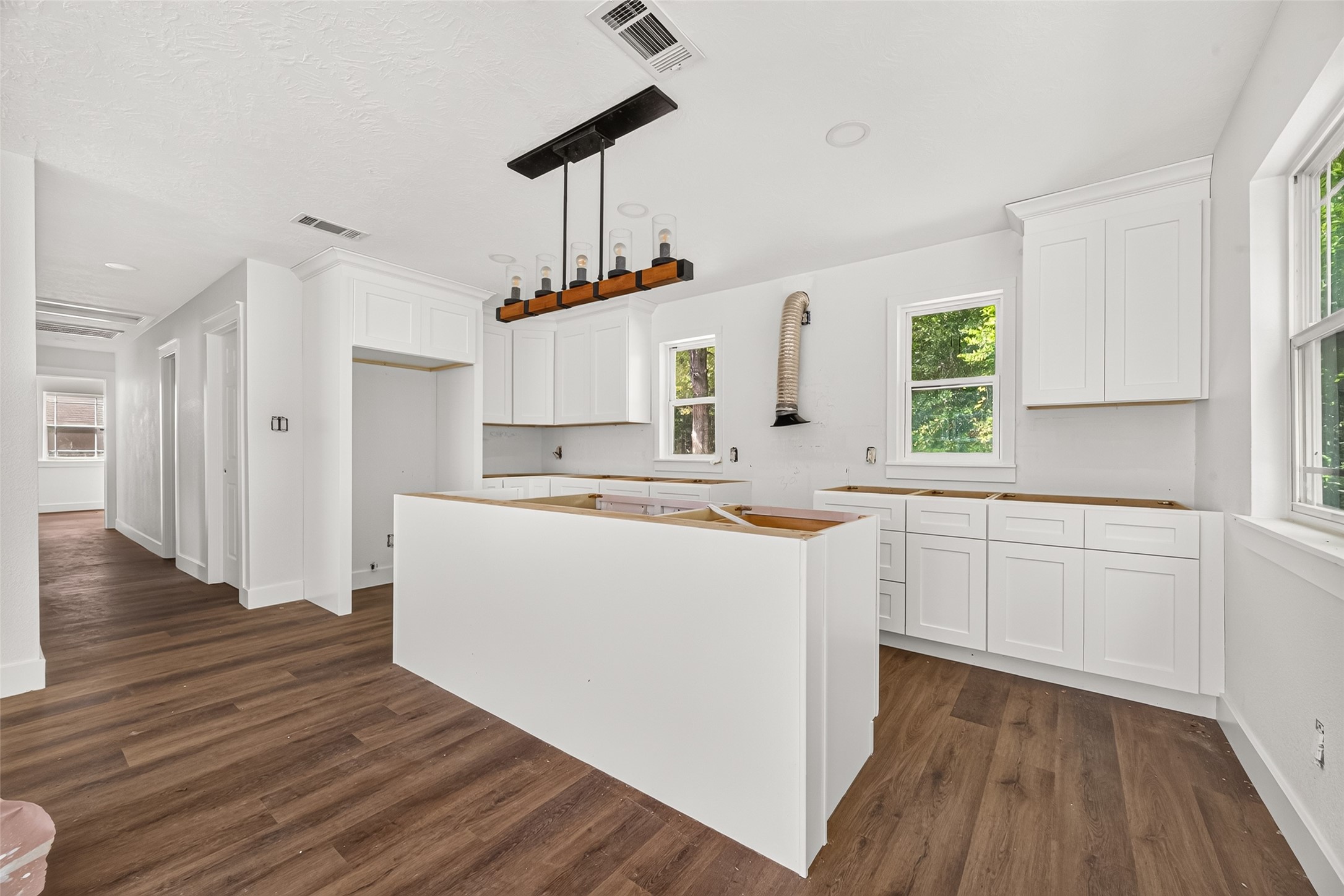 6222 Farm To Market 1010 Road Cleveland, TX 77327 - Photo 13 of 34 Large island anchors the open kitchen