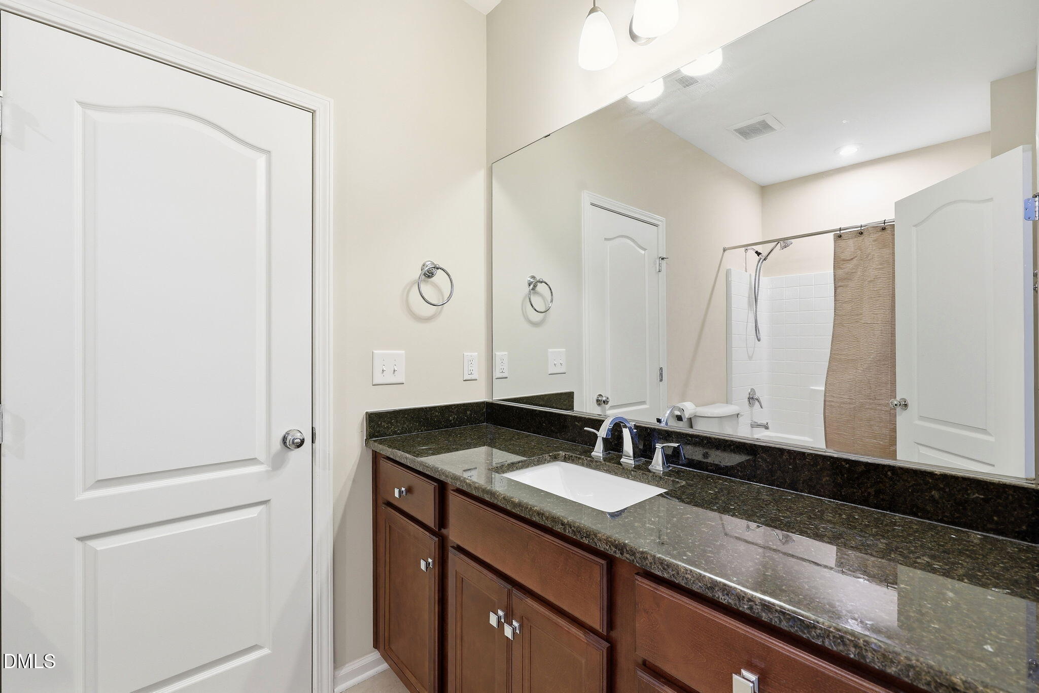 522 Brunello Drive Wake Forest, NC 27587 - Photo 9 of 24 a bathroom with a sink and a mirror