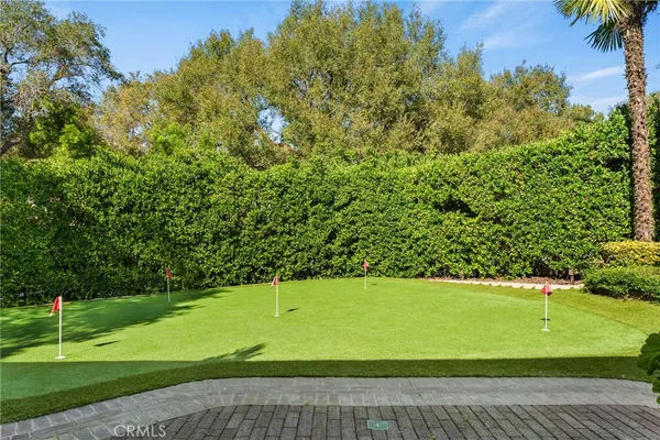 a view of a big yard with swimming pool