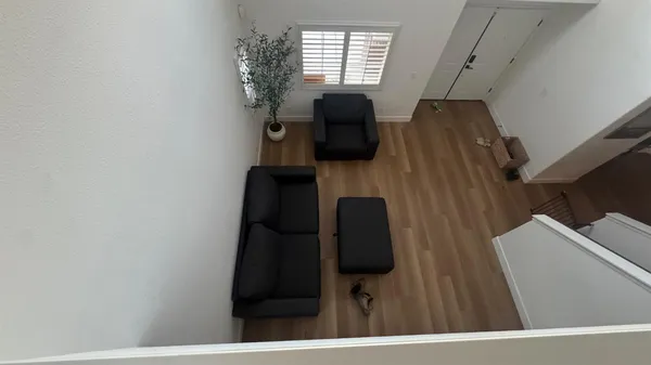 a bedroom with a bed and furniture