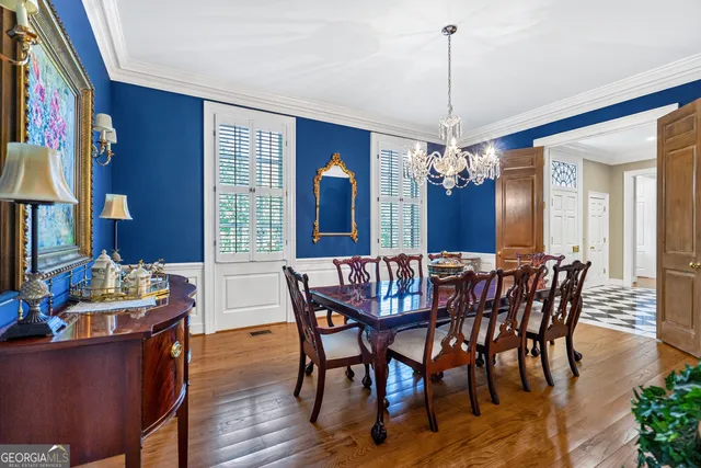a kitchen with stainless steel appliances granite countertop a stove and a refrigerator