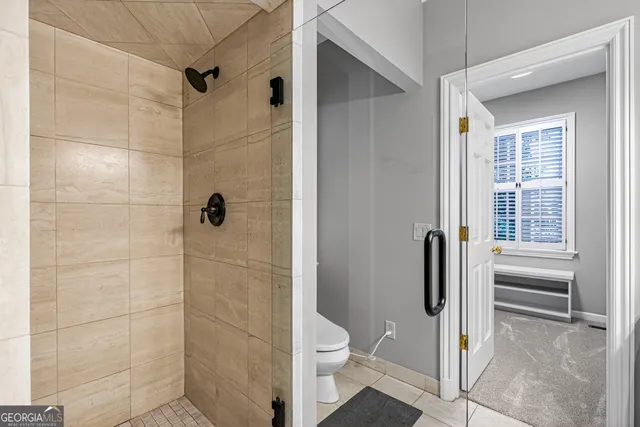 a house with swimming pool in front of it