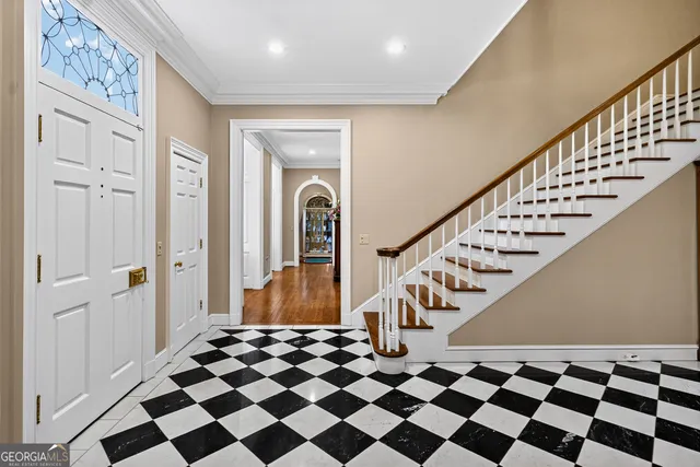 a kitchen with stainless steel appliances granite countertop a stove and a refrigerator