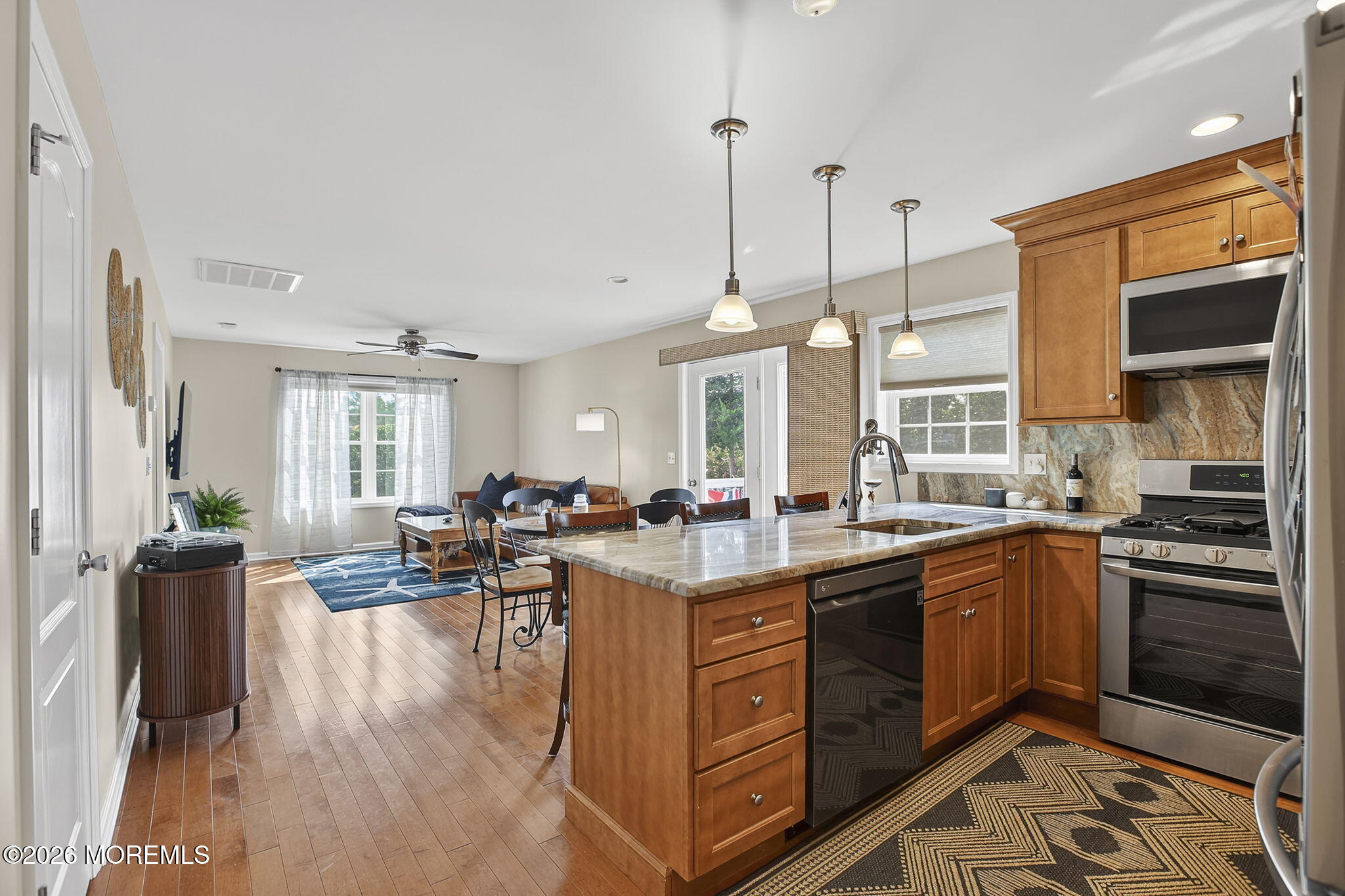 452 Meadowood Road Jackson, NJ 08527 - Photo 34 of 53 Spacious Kitchen & Living Room