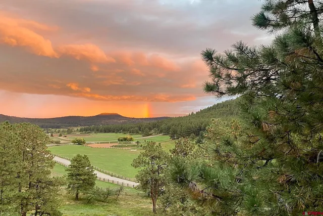 a view of a lake with a mountain in the background