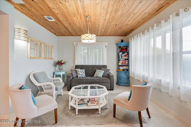 a kitchen with sink and cabinets