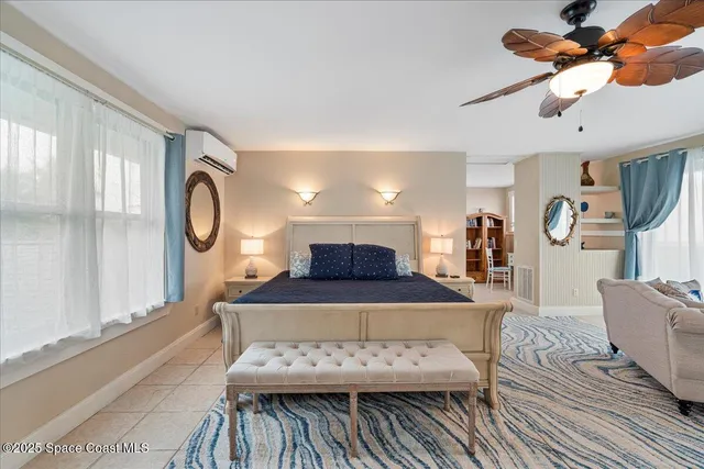 a view of a house with backyard sitting area and garden