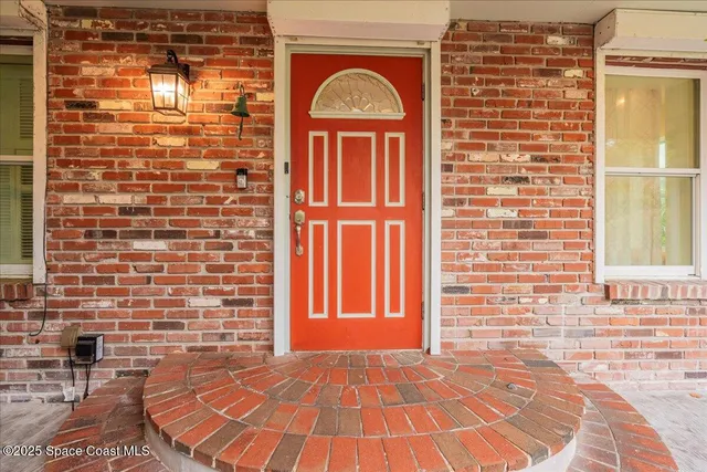 a view of a living room and dining room