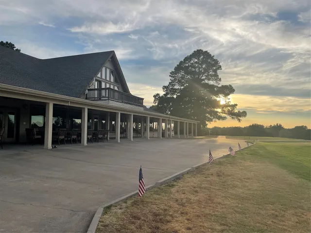 a front view of house with yard and entertaining space