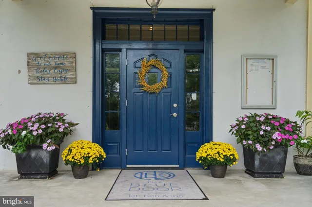 a front view of a house with dining table