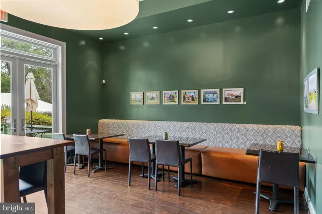 a view of a livingroom with furniture and window