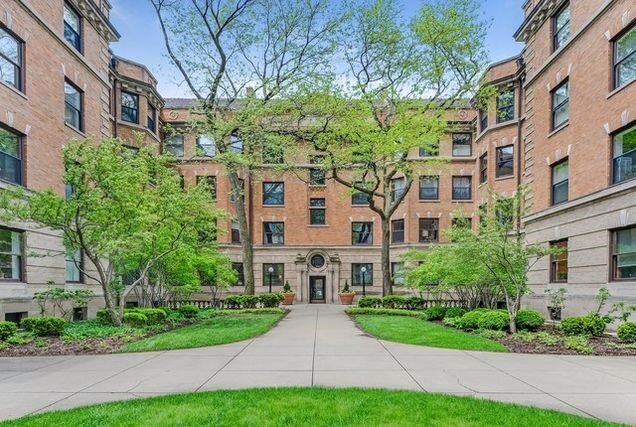 684 West Irving Park Road, Unit E5 Chicago, IL 60613 - Photo 2 of 45 a view of house with yard and green space