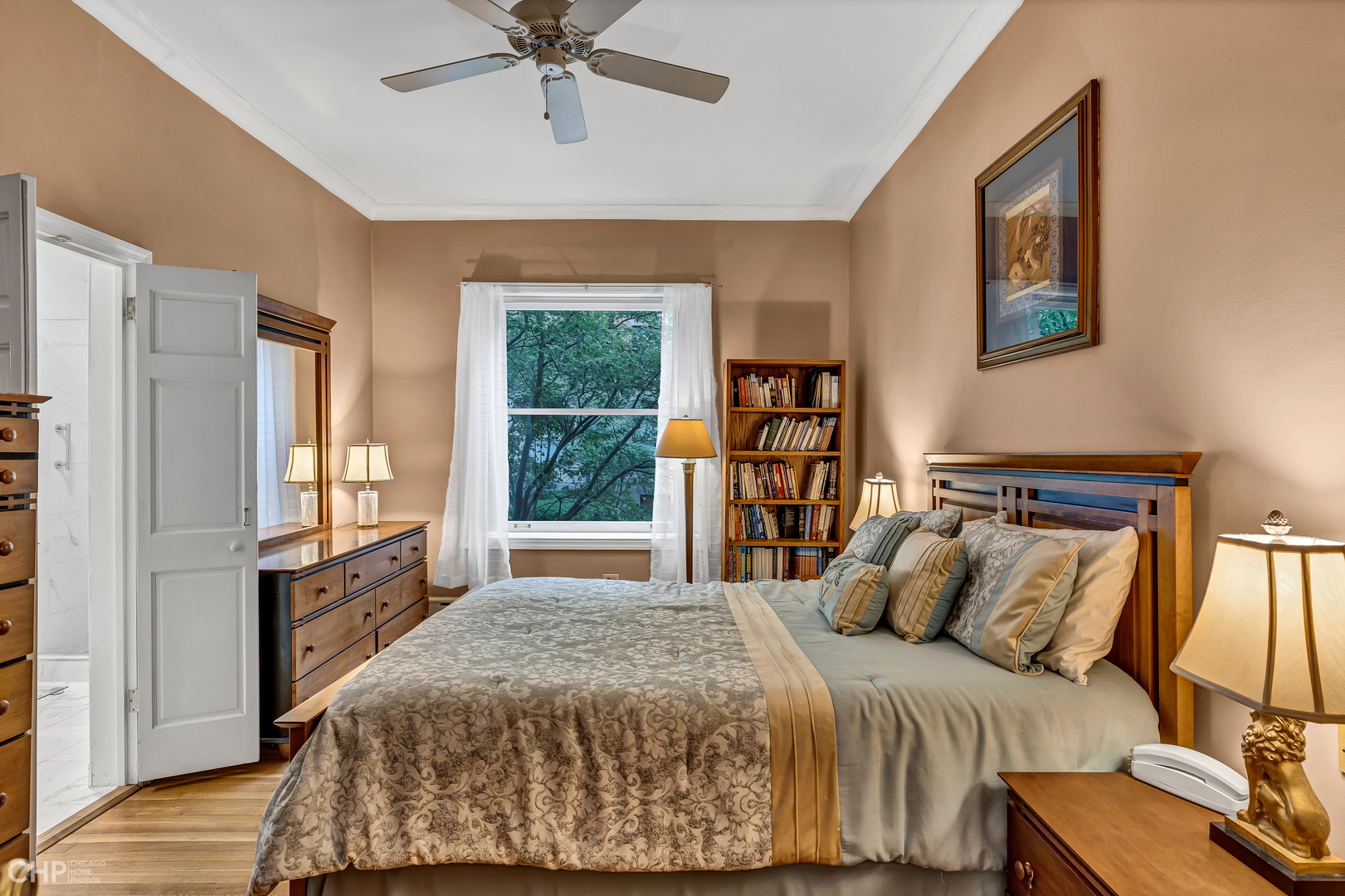 684 West Irving Park Road, Unit E5 Chicago, IL 60613 - Photo 25 of 45 a bedroom with a bed and a window