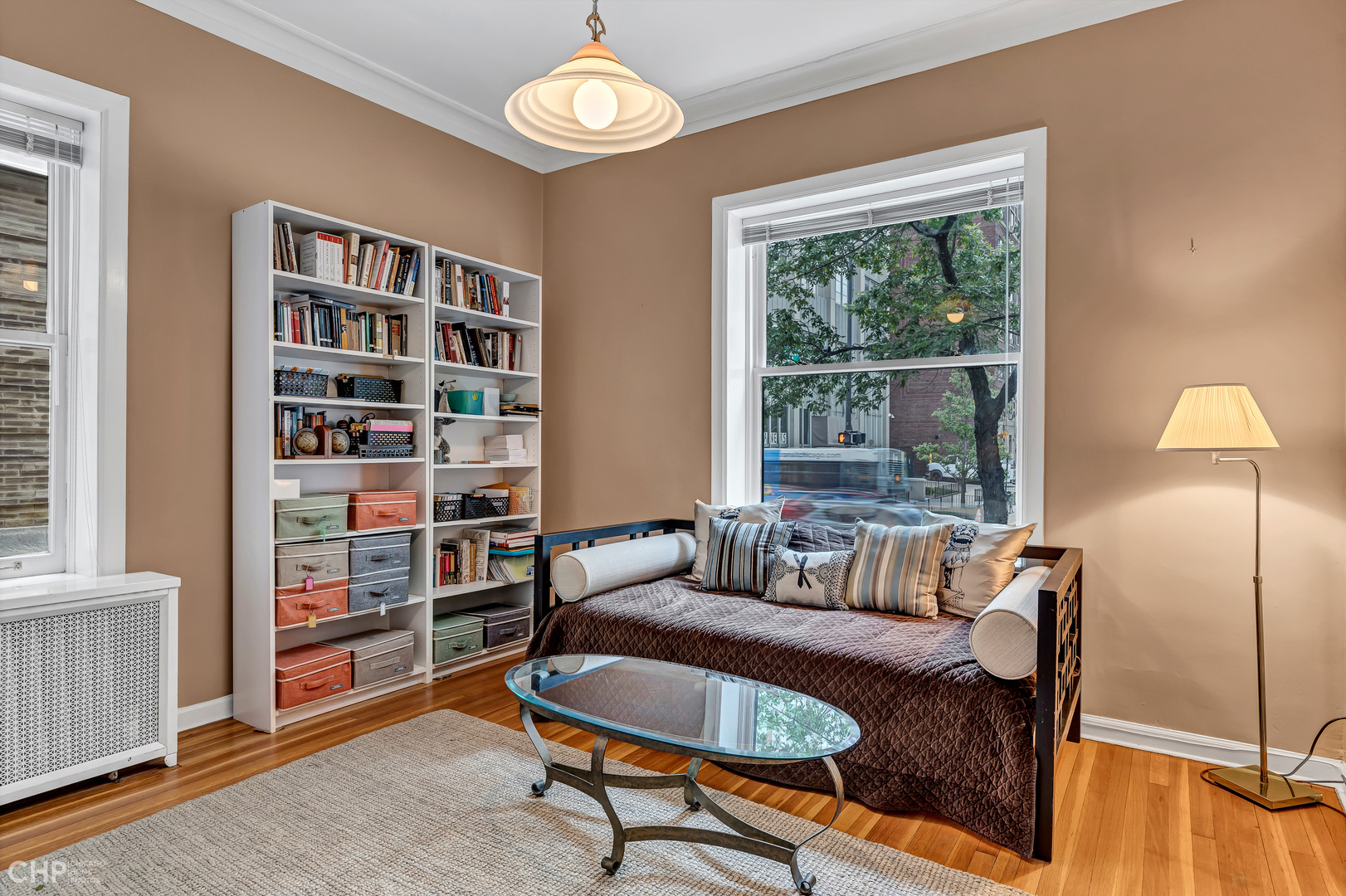 684 West Irving Park Road, Unit E5 Chicago, IL 60613 - Photo 30 of 45 a living room with furniture and a window