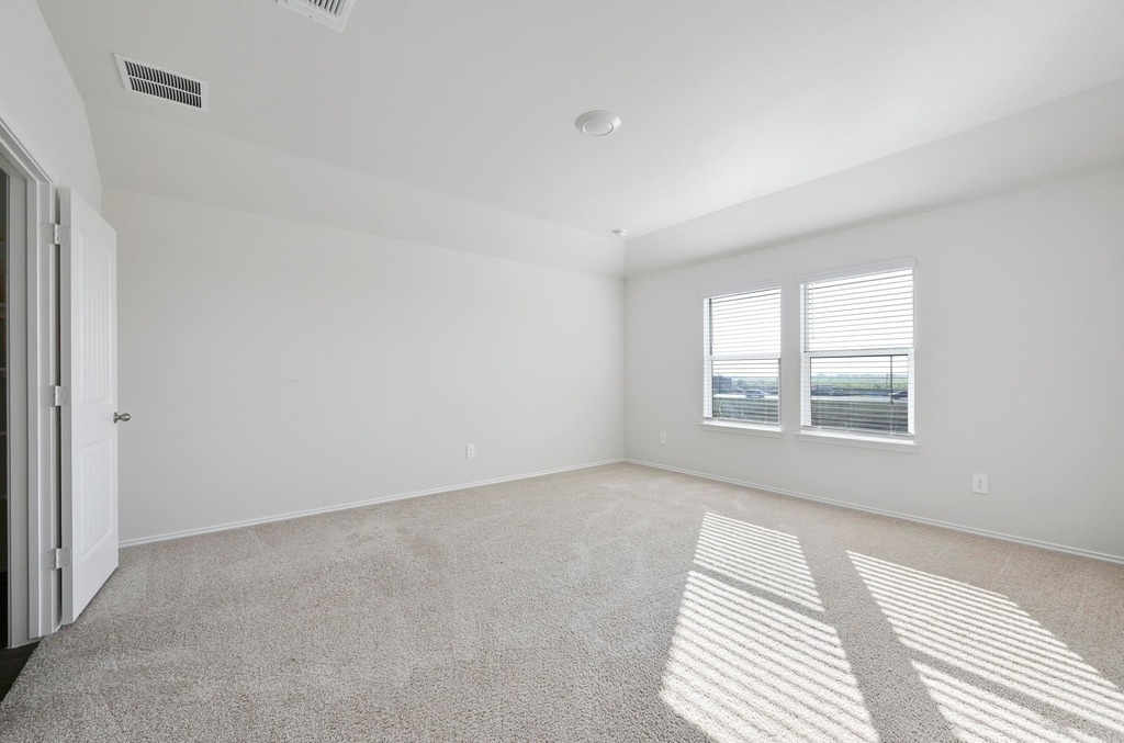 229 Frogmore Loop Kyle, TX 78640 - Photo 14 of 30 a view of an empty room with a window