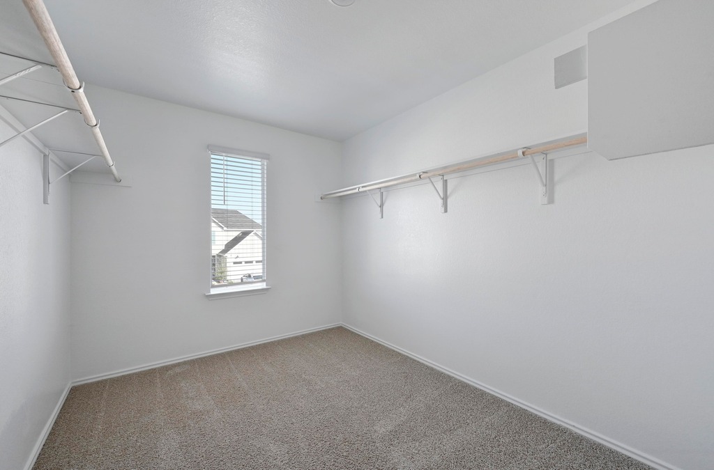229 Frogmore Loop Kyle, TX 78640 - Photo 19 of 30 a view of a room that has a window in it