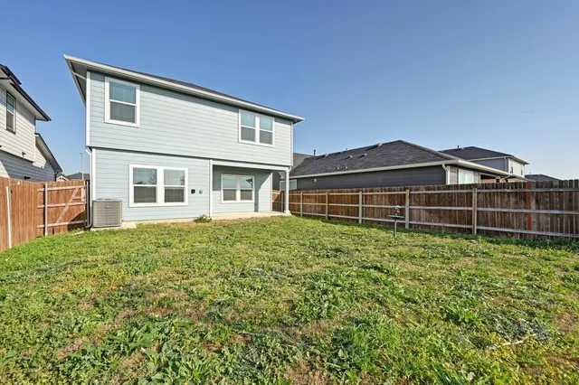 a house view with a garden space