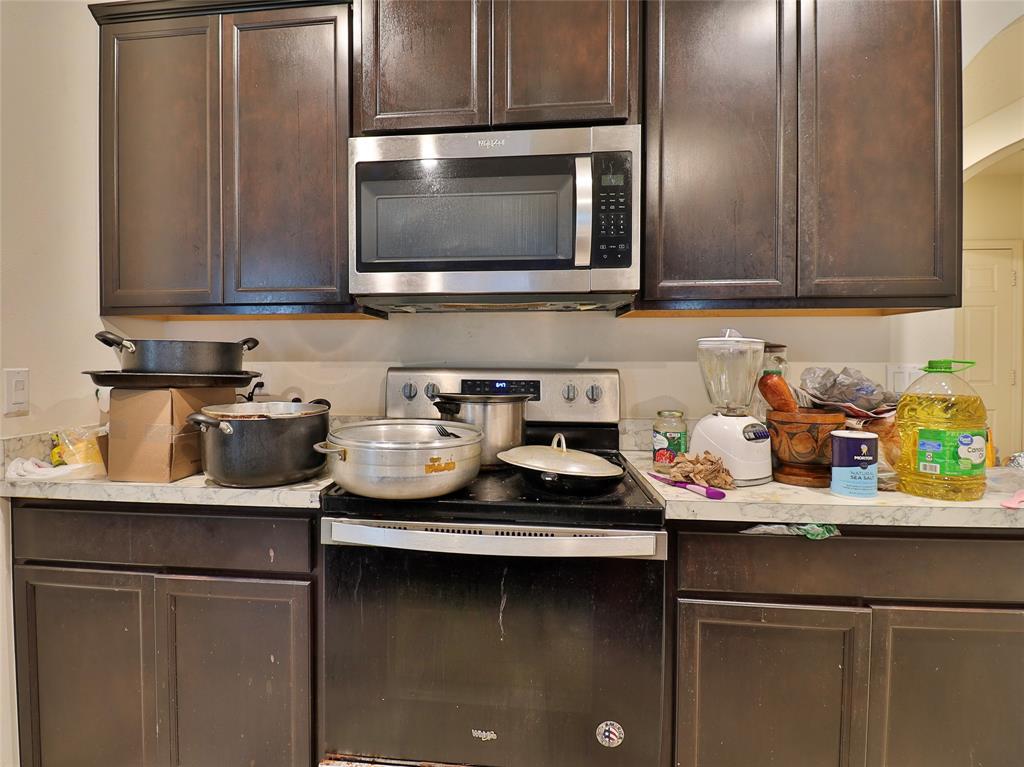 1997 Southwest Cycle Street Port St. Lucie, FL 34953 - Photo 20 of 30 a kitchen with a sink and cabinets