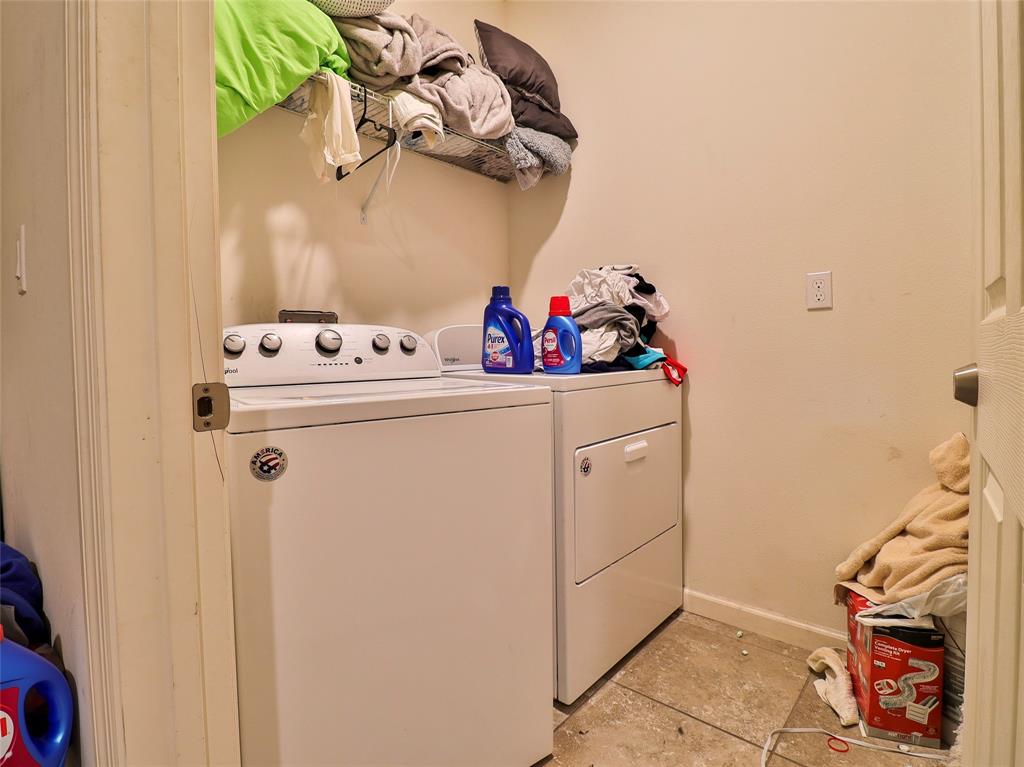 1997 Southwest Cycle Street Port St. Lucie, FL 34953 - Photo 26 of 30 a utility room with dryer and washer