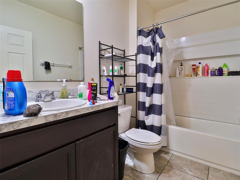 1997 Southwest Cycle Street Port St. Lucie, FL 34953 - Photo 28 of 30 a bathroom with a sink toilet vanity and shower