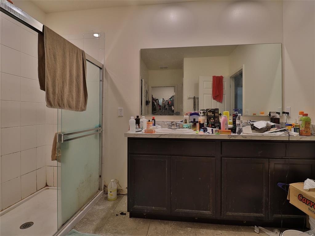 1997 Southwest Cycle Street Port St. Lucie, FL 34953 - Photo 9 of 30 a bathroom with a sink and a mirror