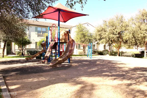 a view of swimming pool with outdoor seating