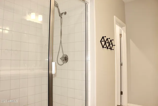 a bedroom with bed and window