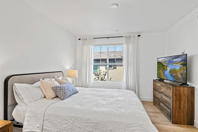 a bathroom with a granite countertop sink mirror and double