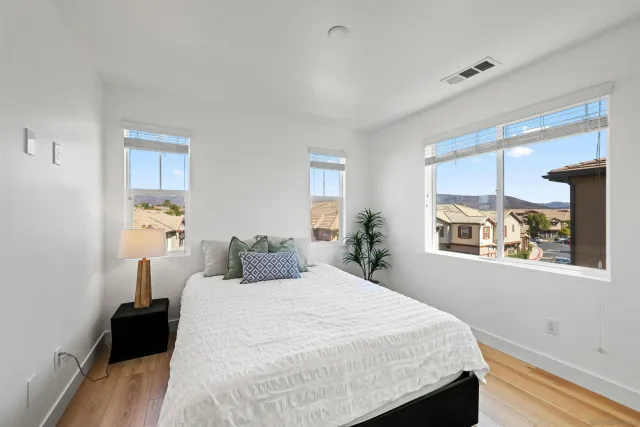 a view of a storage and utility room with washer and dryer