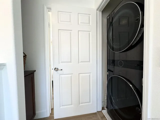 a view of a pathway both side of the house