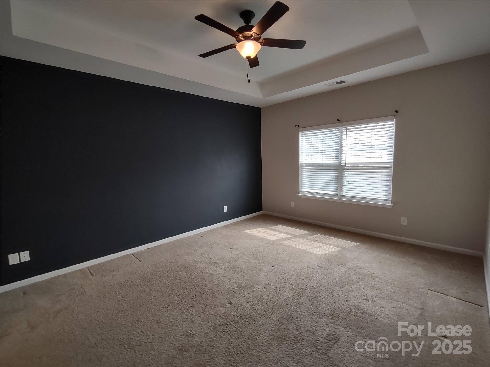 143 Kingston Drive Locust, NC 28097 - Photo 3 of 16 a view of an empty room with a window