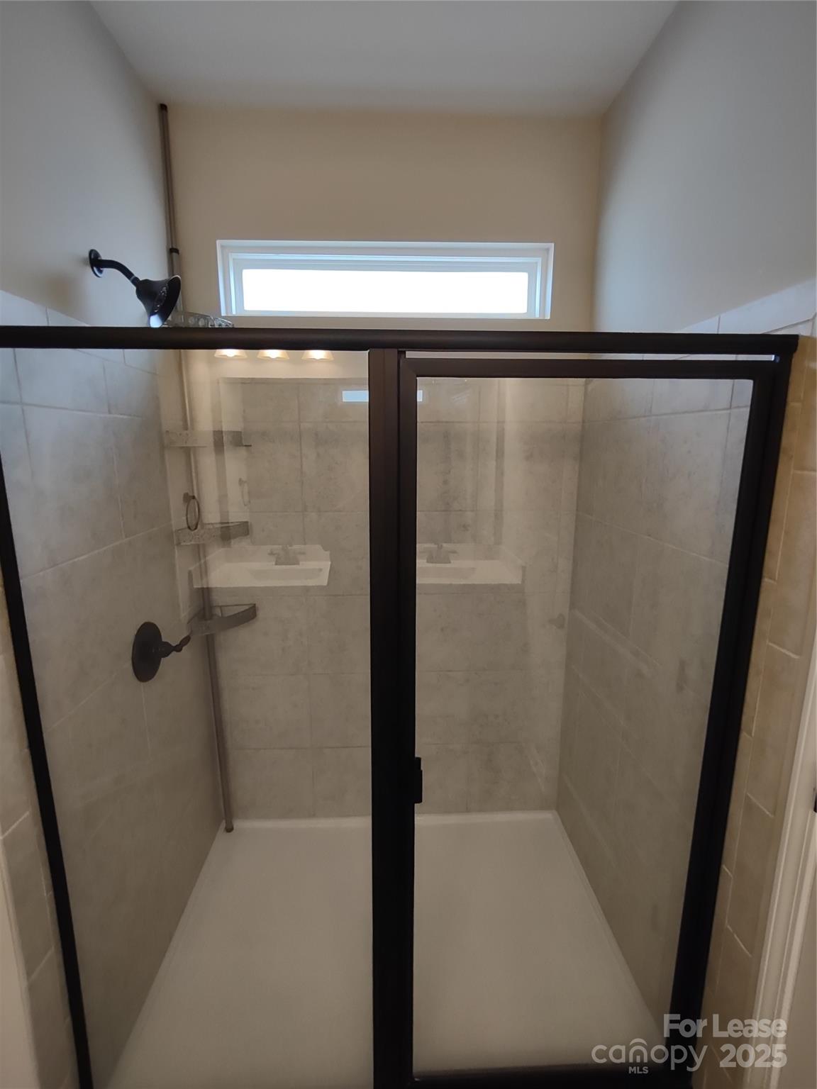 143 Kingston Drive Locust, NC 28097 - Photo 5 of 16 a bathroom with a shower