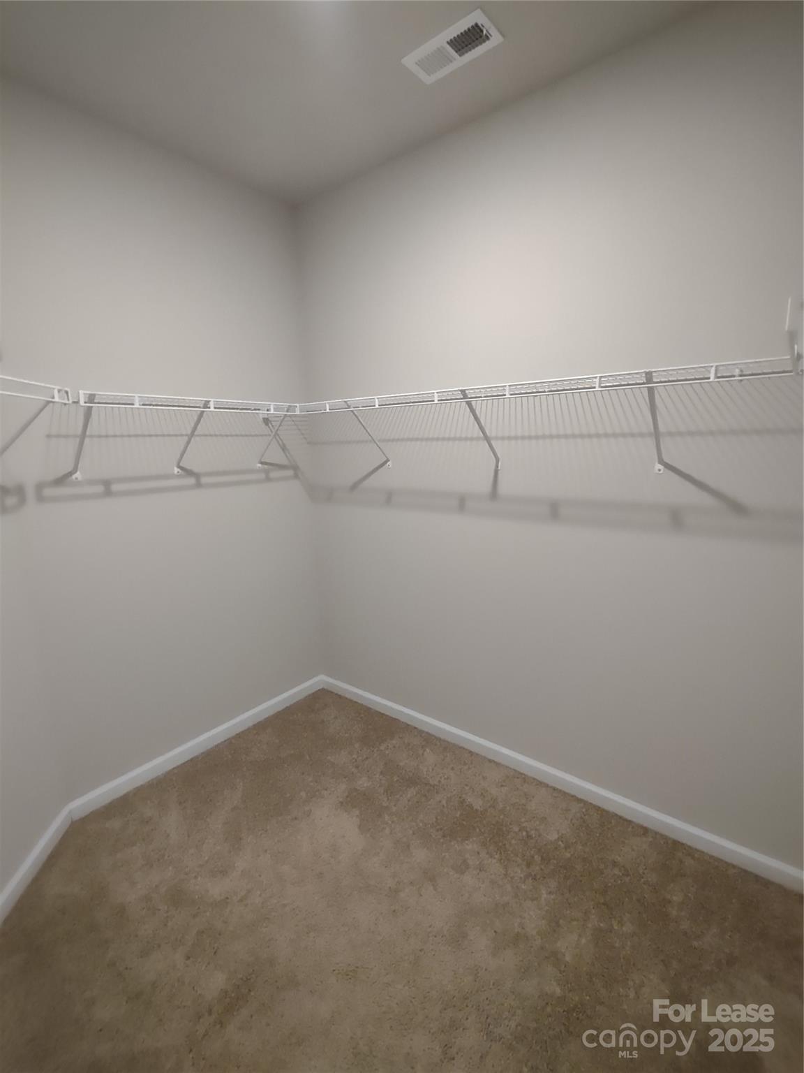 143 Kingston Drive Locust, NC 28097 - Photo 6 of 16 a view of an empty walk in closet