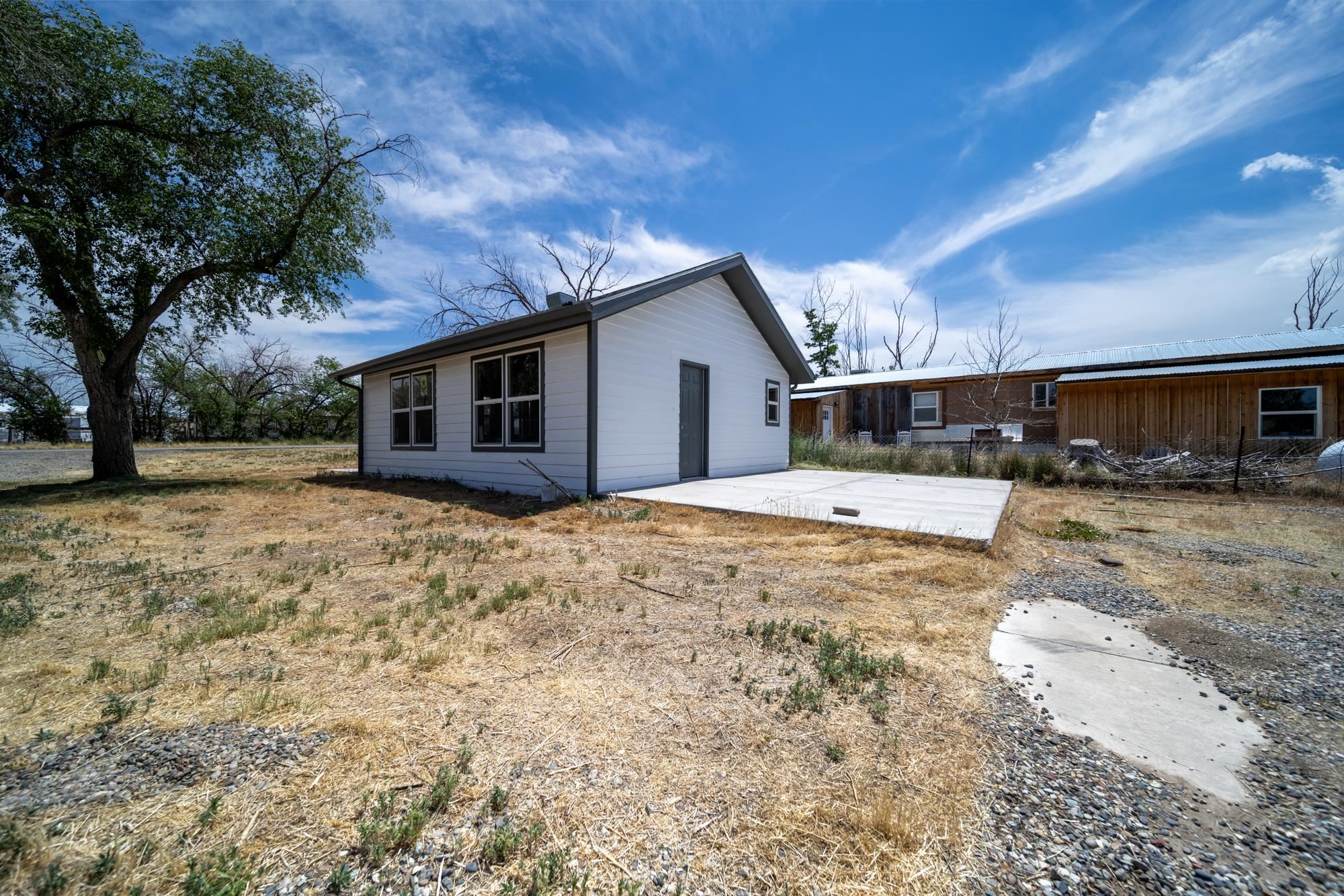 1047 Old Highway Mack, CO 81525 - Photo 12 of 16 a view of a house with a yard
