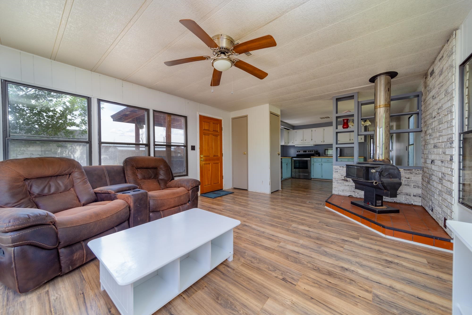 1047 Old Highway Mack, CO 81525 - Photo 2 of 16 a living room with furniture a large window with wooden floor