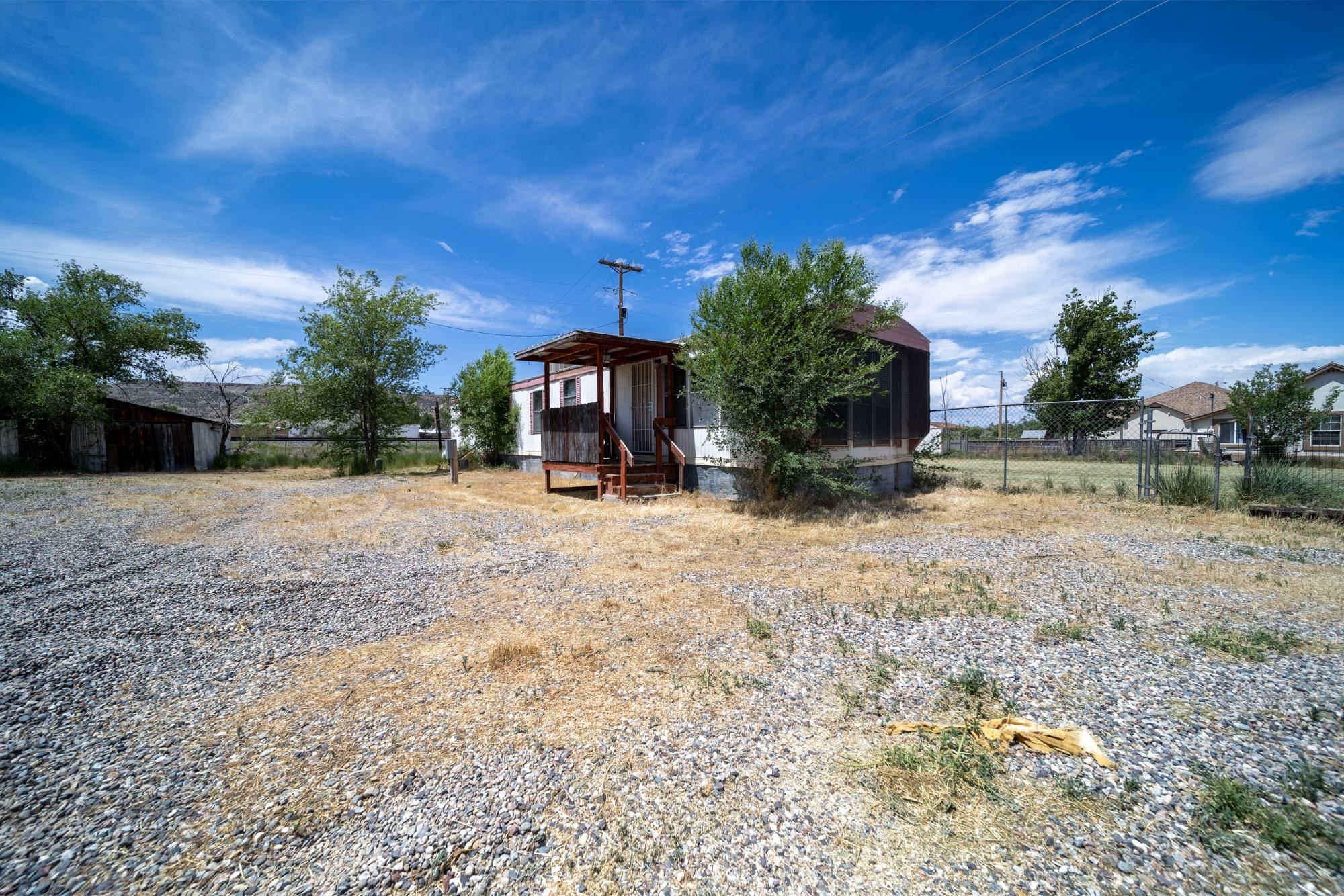 1047 Old Highway Mack, CO 81525 - Photo 10 of 16 a view of a yard with an outdoor space