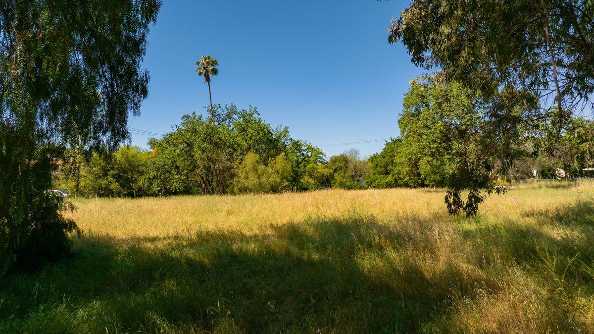 401 South Fulton Street Ojai, CA 93023 - Photo 12 of 30 a view of a lake with a yard