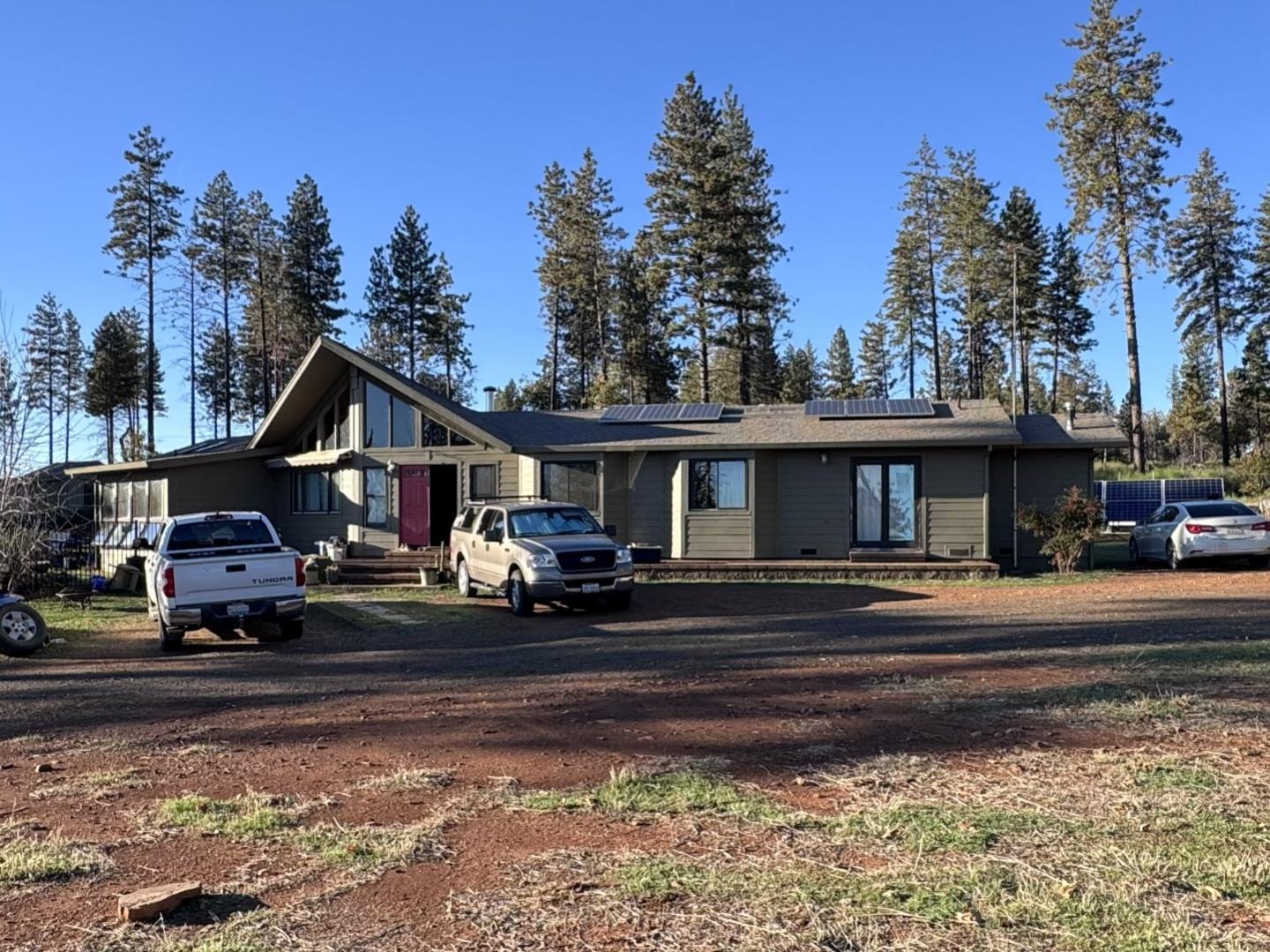12168 Granite Ridge Road Oroville, CA 95965 - Photo 1 of 34 a front view of a house with a yard