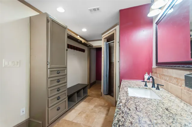 a very nice looking room with a large mirror