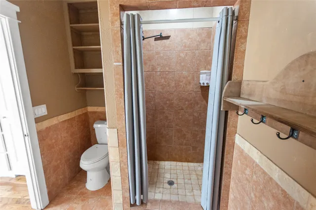 a view of a swimming pool with a yard