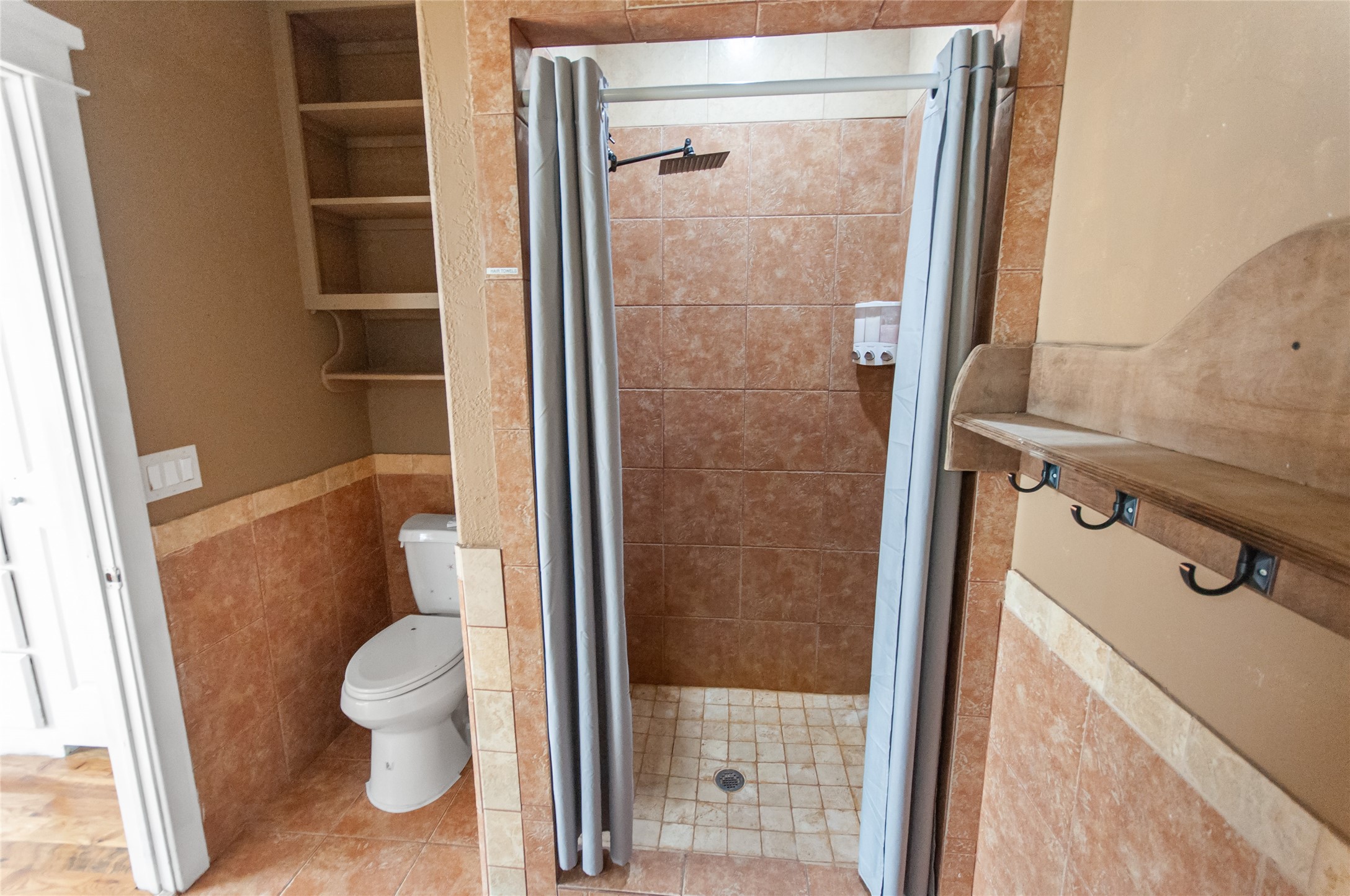 6588 Starks Road Mason, TX 76856 - Photo 36 of 40 a bathroom with a toilet and a shower