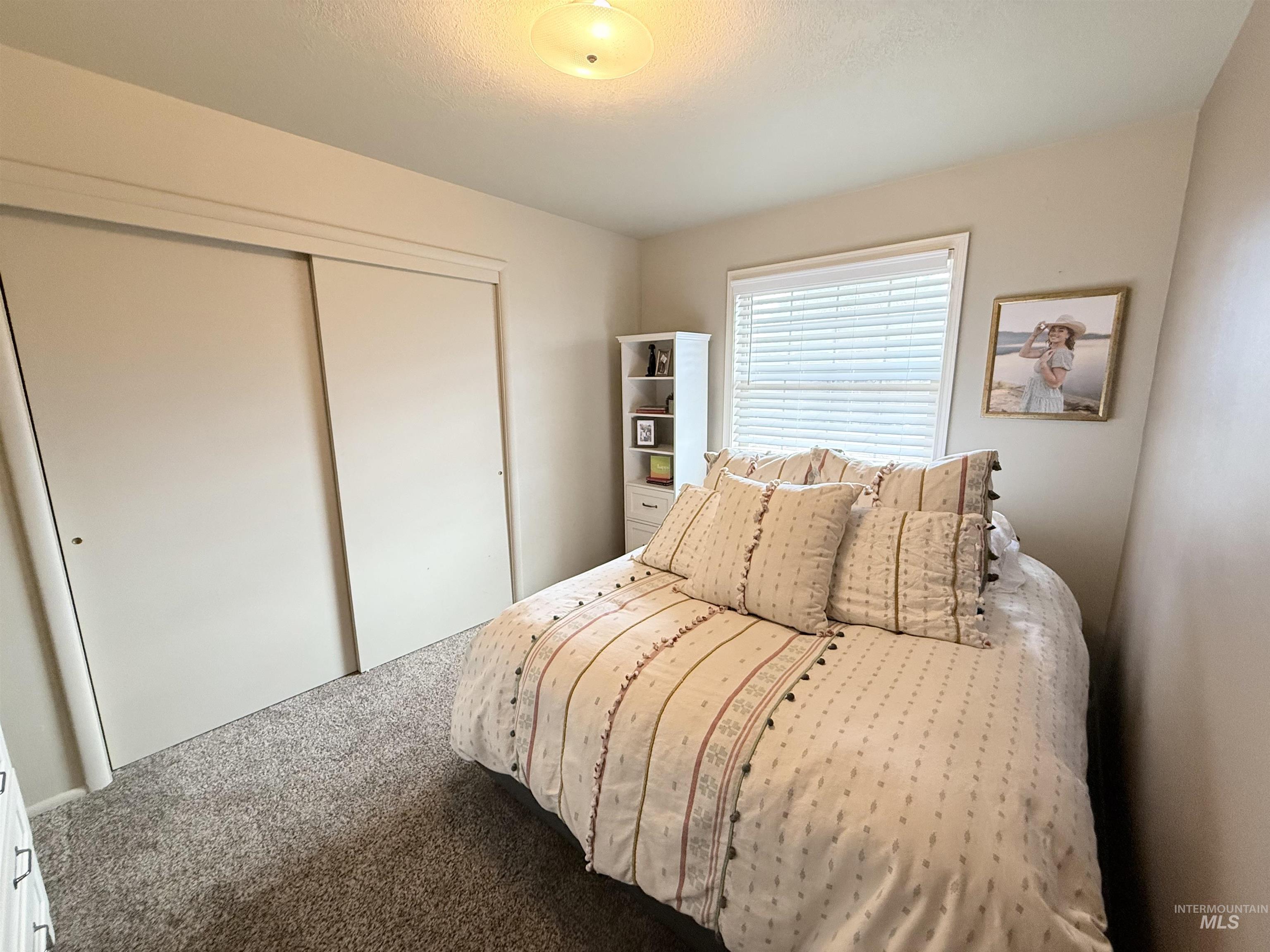 624 20th Street Rupert, ID 83350 - Photo 14 of 31 Carpeted bedroom with a closet